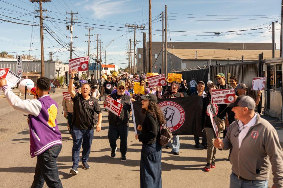 Gig drivers and community allies rallying on March 26, 2026