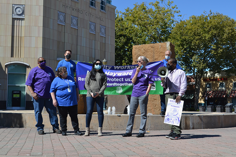 Suzanne Philis addresses the coalition rally in front of City Hall.