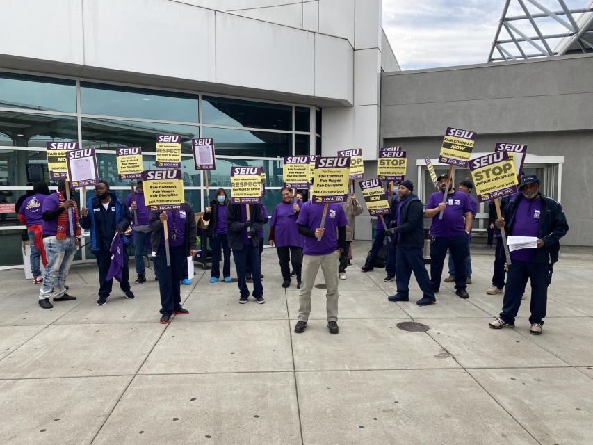 Port of Oakland members picket at Oakland International Airport.