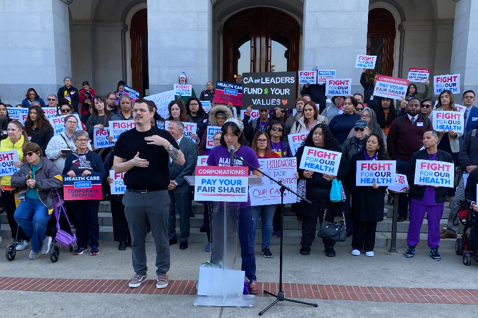 Jodi Huang speaks out for the community at the Fight For Our Health rally. Jodi Huang speaks out for the community at the Fight For Our Health rally.