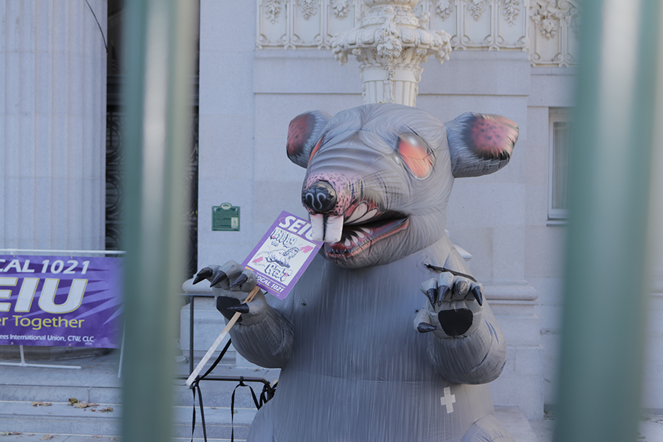 Scabby outside Oakland's City Hall during an unfair labor practice strike in December of 2017.