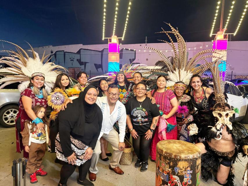 SEIU 1021 Latino Caucus leadership team (from left, Vice Chair Laura Ocon, Chair Angel Valdez and Secretary Veronica Palacios) with Ehecatl Tonatiuh Aztec Dance Group