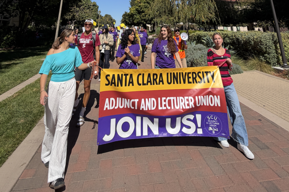 SCU students help lead the walk/roll around the campus in solidarity with SCU teaching faculty