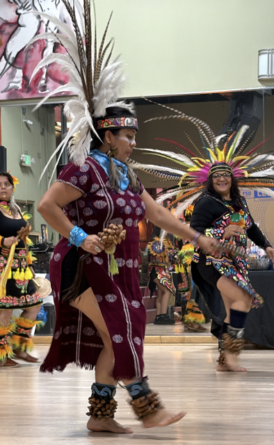 Ehecatl Tonatiuh Aztec Dance Group members perform for attendees