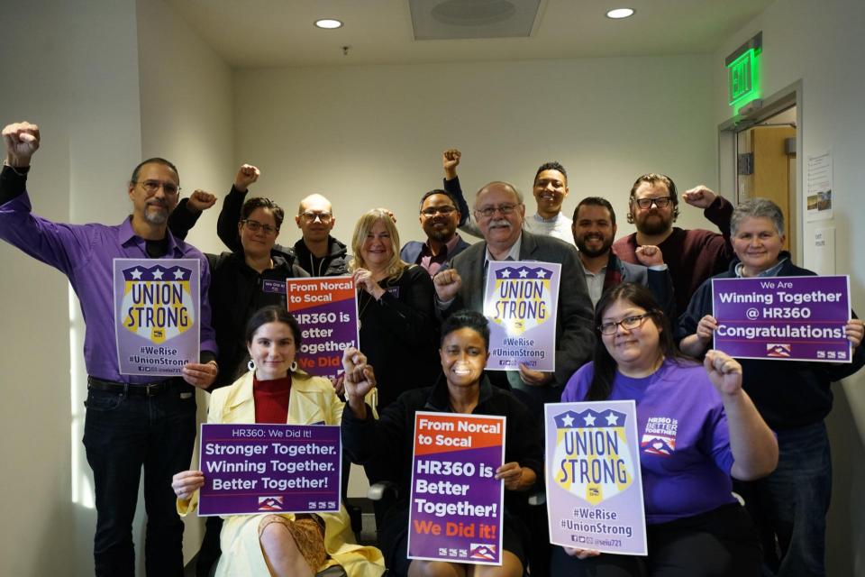 HealthRIGHT360 workers stand with members of their new union, SEIU, after learning the news that their co-workers voted overwhelmingly to organize across California.