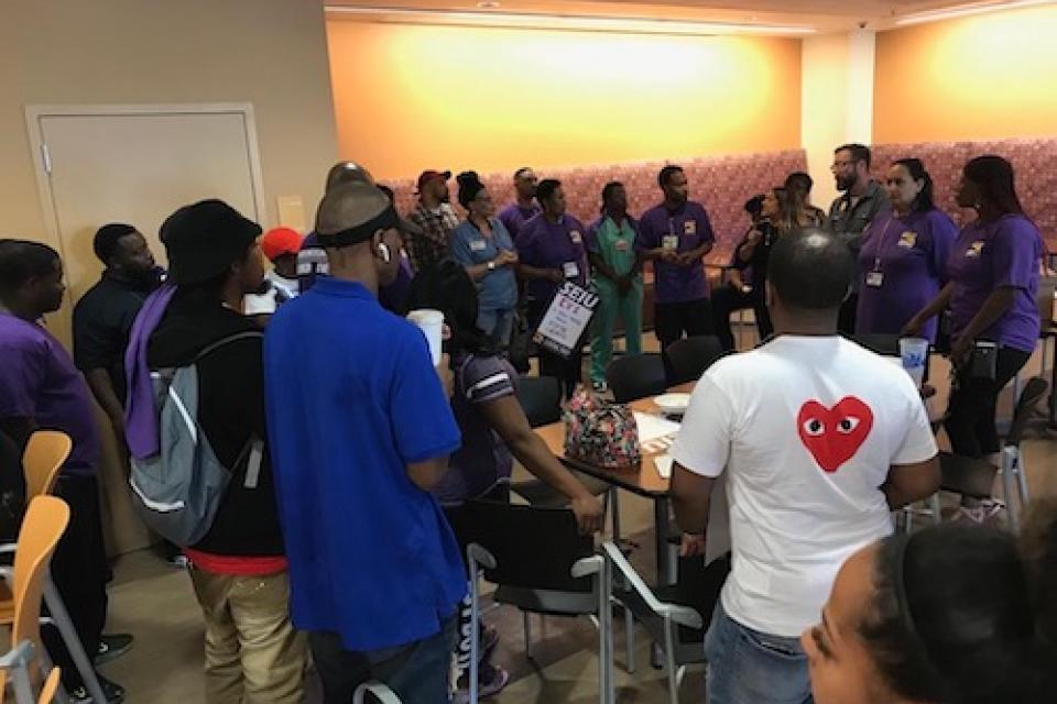 AHS workers planning to take action at the September Board of Trustees meeting. When workers unite and fight to make changes at work, we have the power to win.