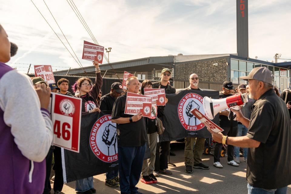 Members of the California Gig Workers Union rallying for accountability of autonomous vehicles in March, 2026