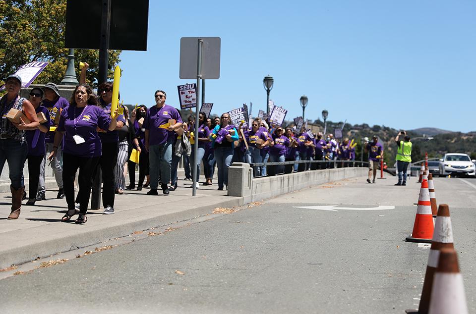 Napa County workers march downtown, demanding swift action to address the staffing crisis