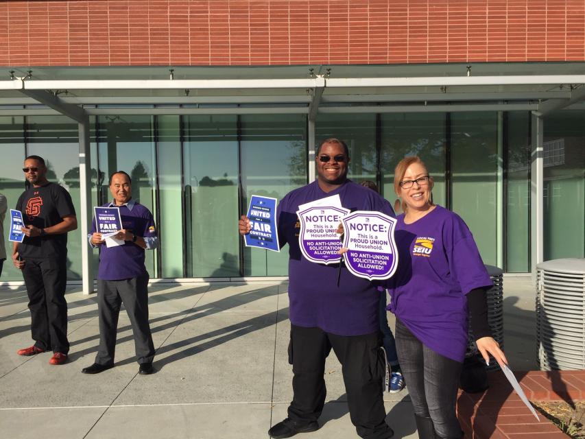 SEIU 1021 members stand together and show their solidarity.