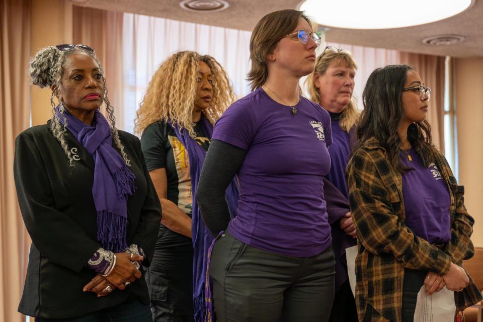 Marin Housing Authority employees preparing to deliver public comment to Board of Commissioners about Nan McKay